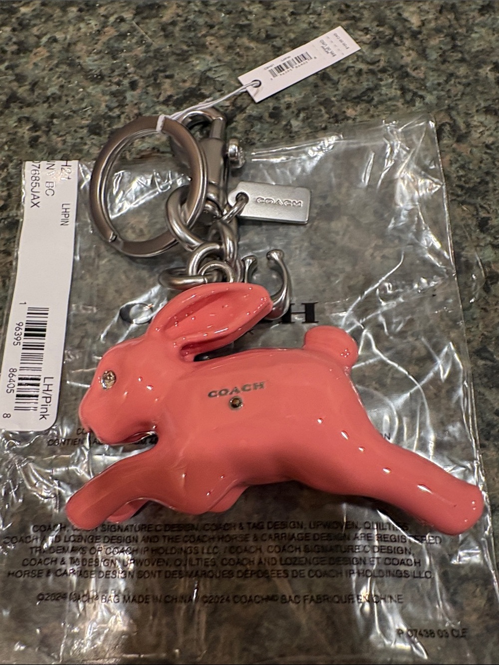 Nwt Pink Resin Bunny Rabbit Coach Bag Charm in silver. . PRICE IS FIRM !!